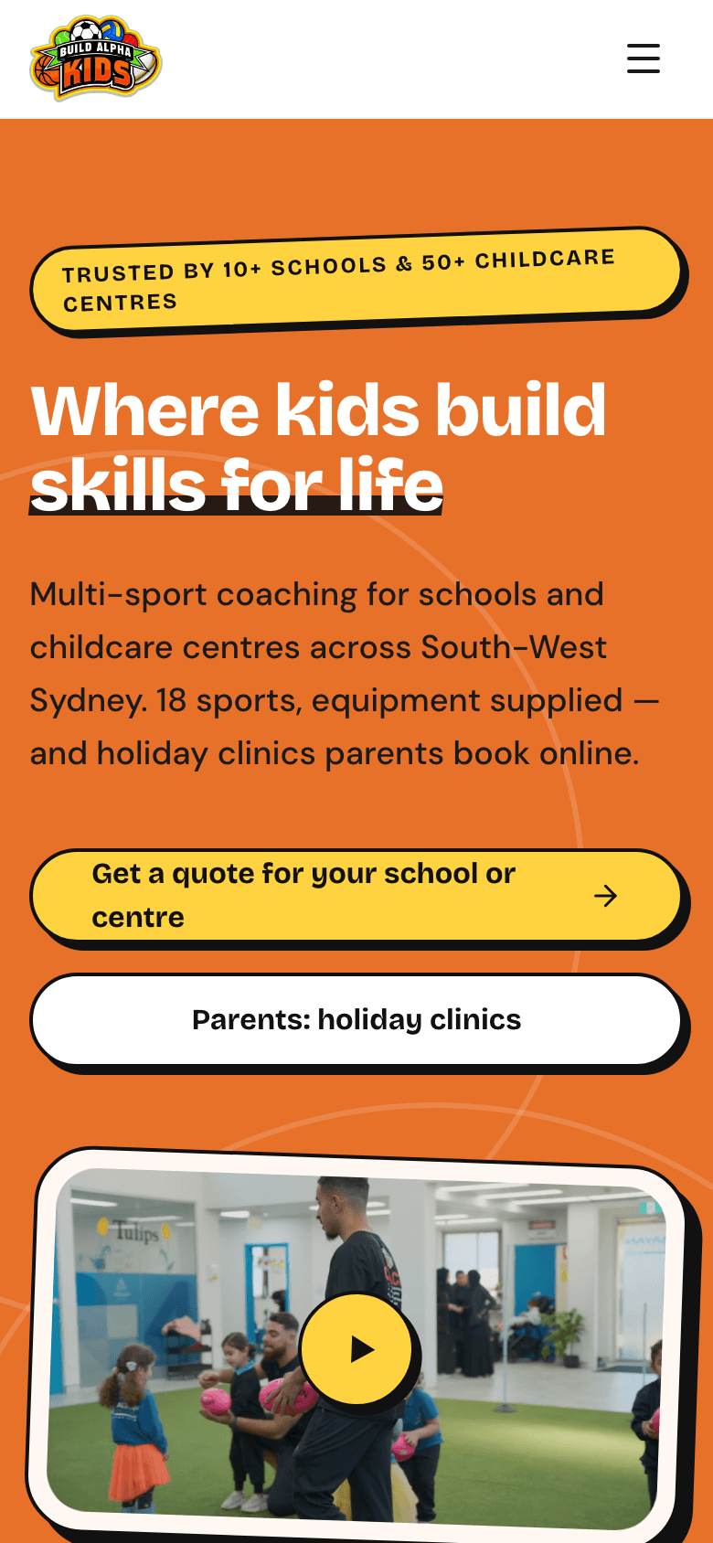 BuildAlphaKids homepage on a phone